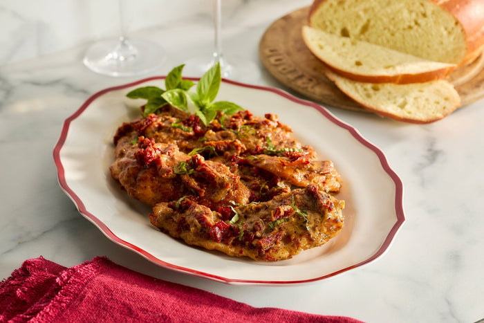 One-Pan Marry Me Chicken with Sun-Dried Tomatoes on Stella Platter in Crimson