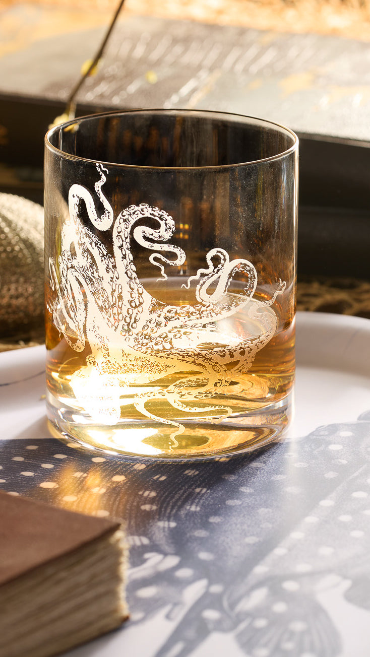 Caskata's Lucy the Octopus Crystal Etched Rocks Glass glinting in the sun