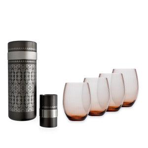 A patterned metal thermos with a screw cap is displayed beside four ribbed amber tumblers on a white background—ideal for serving drinks from your Caskata Golden Hour Bar Bundle.