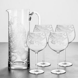 The Lucy the Octopus Sangria Bundle featuring a glass pitcher and four wine glasses in lead-free crystal, each etched with a detailed octopus design.
