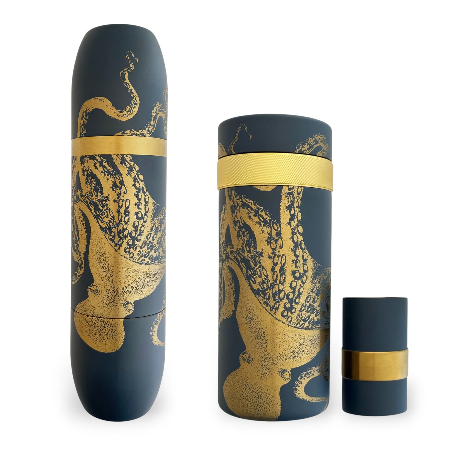 The Caskata X High Camp Lucy Bar Master Bundle features three matte navy-blue cylindrical containers with gold octopus art and bands, offering nautical charm—ideal for wine and cocktail lovers. Shown elegantly on a white background.