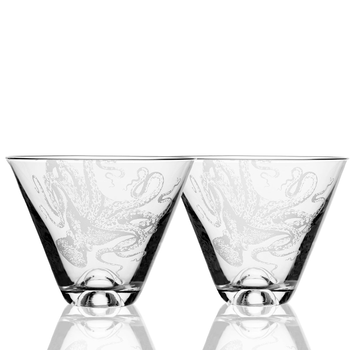 Two Lucy Stemless Martini Glasses by Caskata Artisanal Home, crafted from lead-free crystal with etched octopus designs, are shown side by side on a white background.