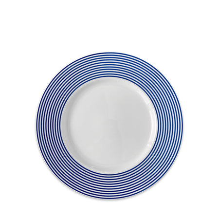 Newport Stripe Rimmed Salad Plate crafted from high-fired porcelain featuring a Newport Stripe design with blue concentric circles around the rim by Caskata Artisanal Home.