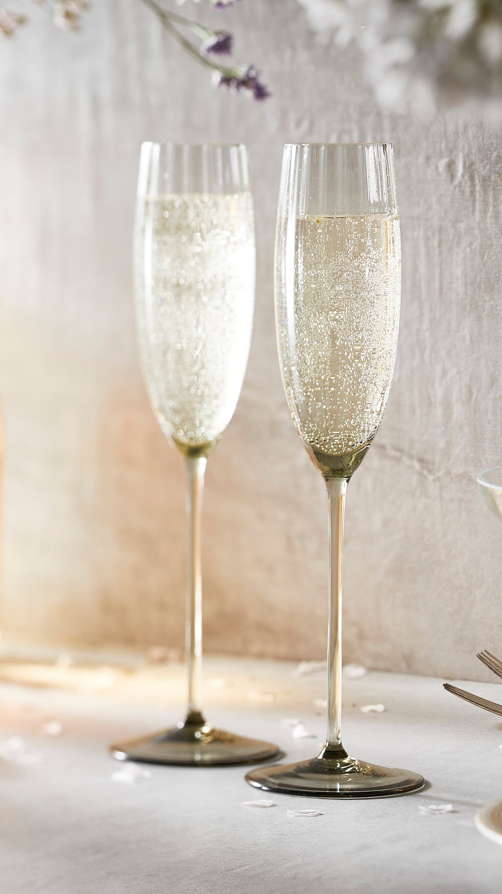 Quinn Crystal Smoke Champagne Flutes in a Wedding Setting From Caskata