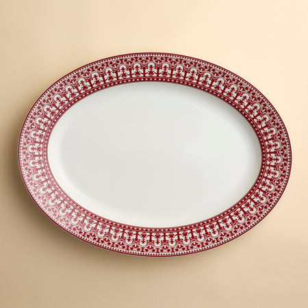 Casablanca Crimson large oval platter in an ornate scrollwork pattern around the rim in porcelain from Caskata