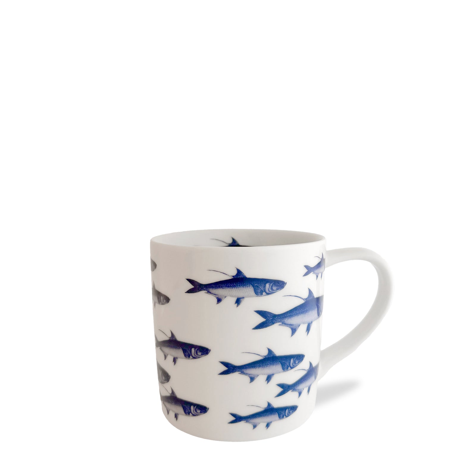 School of Fish Mug in Blue from Caskata in high-fired porcelain this mug holds 14 oz. and is decorated with our signature school of fish.
