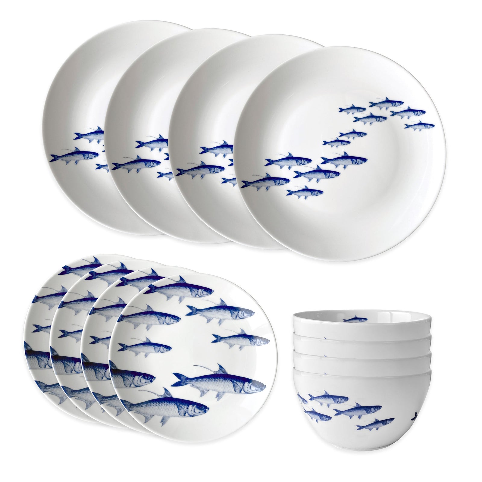 The Caskata School of Fish Table for 4 is a porcelain dinnerware set with blue fish on white, including 4 plates, 4 side plates, and 4 bowls. All pieces are dishwasher and microwave safe for everyday convenience.